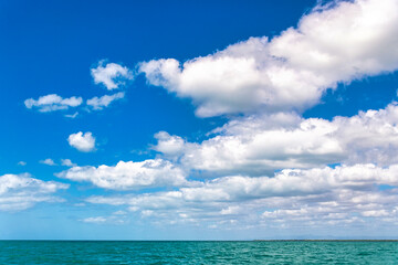 Naklejka na ściany i meble Seascape with beautiful clouds
