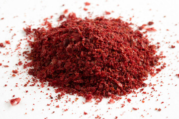 red chili powder on a white background