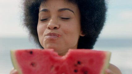 beautiful woman eating watermelon on beach enjoying delicious juicy fruit smiling happy female having fun summertime by the sea 4k footage - Powered by Adobe