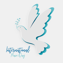 Paper Cutout Pigeon with leaf symbol of Peace. International Peace Day