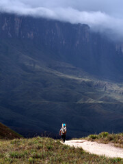 Fototapeta na wymiar Mount Roraima, Venezuela - 22.04.2019: Hiker on the trail to Mount Roraima