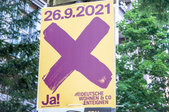 Berlin, Germany - September 2, 2021: Campaign poster Ja! zum Volksentscheid, German for Yes to the referendum, for the referendum "Expropriate Deutsche Wohnen and Co." in August 2021