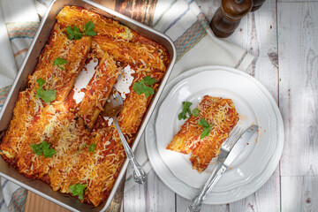 Vegetarian manicotti filled with cottage cheese, dill