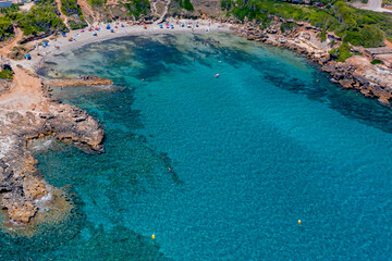 Fototapeta na wymiar 4k Aerial Drone secrets Places in Mallorca Mediterranean sea transpaernt water perfect 4 Snorkeling