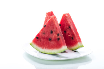 pieces of fresh ripe red watermelon on white