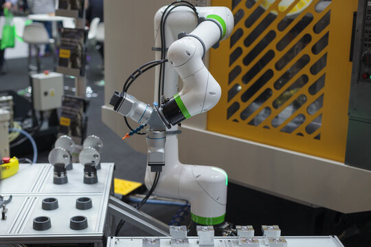 Poznan, Poland 01 Sep 2021: Fanuc robot CRX-10iA collaborative robots. Robot arm in technology process, automatic industrial robot. ITM Industry Europe, HIGH TECH EXPO.