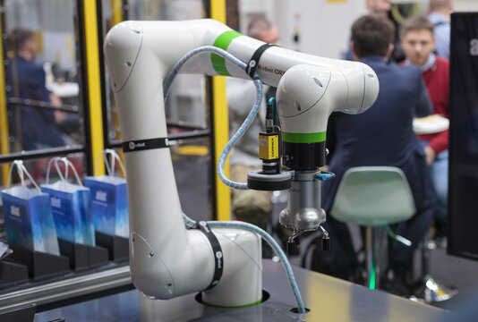 Poznan, Poland 01 Sep 2021: Fanuc robot CRX-10iA collaborative robots. Robot arm in technology process, automatic industrial robot. ITM Industry Europe, HIGH TECH EXPO.
