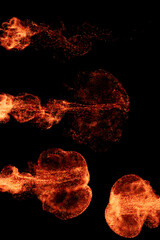 3d render of exploding with particles and depth of field. Warm bright flame. Detailed simulation.