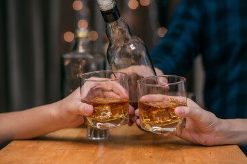 Celebrate whiskey on a friendly party in restaurant