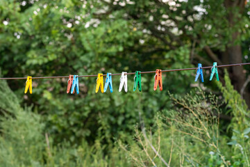 Fototapeta na wymiar plastic clothespins for drying clothes