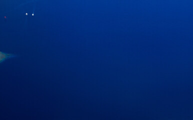 Obraz na płótnie Canvas Calm clear blue sea water background. Blue azure sea water texture.