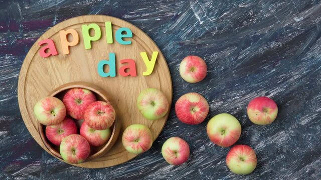 Apple day october 21. Apple harvest on a dark background top view