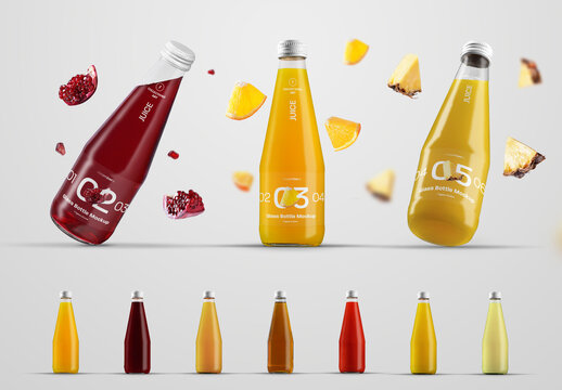 Three Glass Juice Bottle Mockups with Flying Fruits