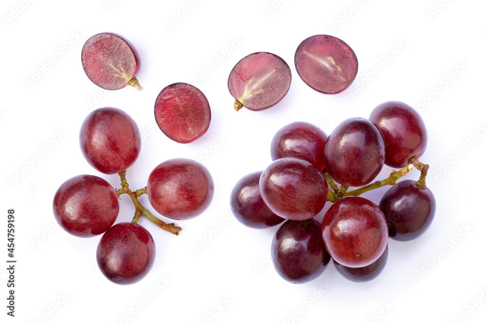 Wall mural red grapes fruit with half slice isolated on white background.