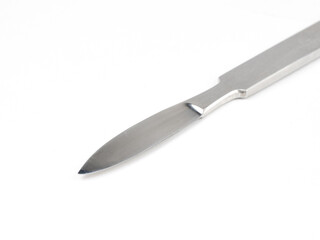 the steel medical scalpel on a white background