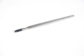 the steel medical scalpel on a white background