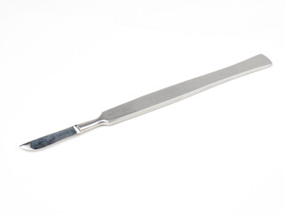 the steel medical scalpel on a white background