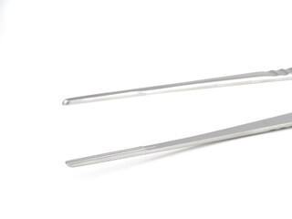 straight steel surgical tweezers with teeth on a white background