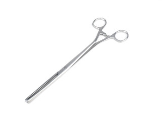 steel surgical clamp on white background