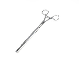 steel surgical clamp on white background