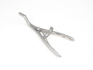 steel surgical clamp with retainer on a white background