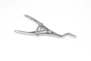 steel surgical clamp with retainer on a white background