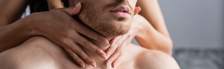 partial view of young woman hugging boyfriend, banner.
