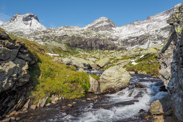 Messelingbach creek below lake Gruensee at Hohe Tauern mountain range