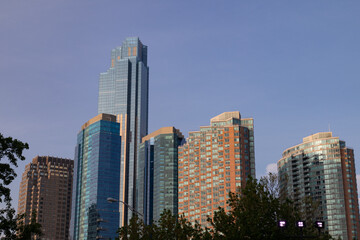 Fototapeta na wymiar Modern Skyscrapers in Downtown Jersey City New Jersey and a Blue Sky