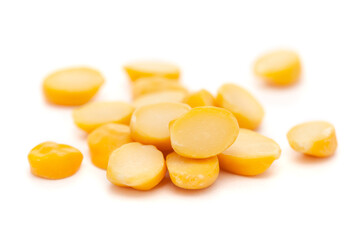 Micro close-up and details of Organic Indian Bengal Gram (Cicer arietinum) or split yellow chana dal  isolated over white background.