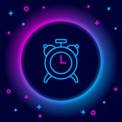 Glowing neon line Alarm clock icon isolated on black background. Wake up, get up concept. Time sign. Colorful outline concept. Vector