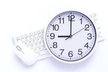 Wireless computer keyboard and mouse with clock at white background