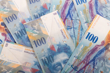 Bank bills of 100 CHF Swiss banknotes
