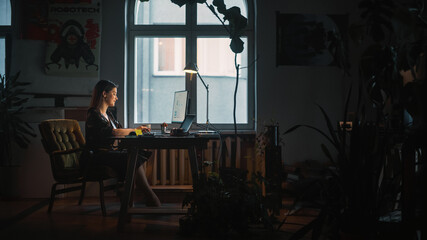 Young Female Professional Works on a Desktop Computer in Creative Agency in Authentic Loft Office....