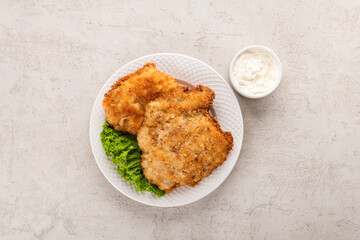 white meat chicken chop on a white plate