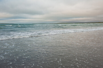 Beautiful dramatic sea waves and gloomy sky