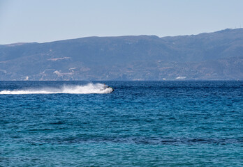 landscape overlooking the sea coastal strip and a sea ship on the horizon 