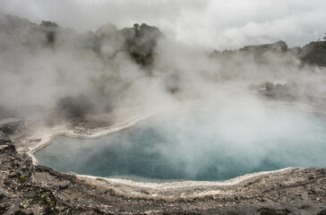 Fototapeta na wymiar View of lakes and land steaming through Geyser on New Zealand's North Island