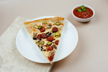 A slice of pizza with pepperoni