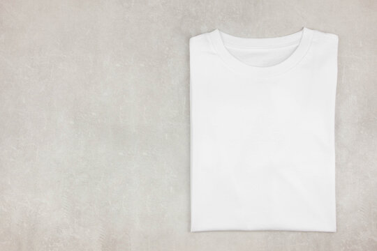 folded white t shirt