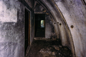 Fototapeta na wymiar Abandoned underground depot in Soviet military base
