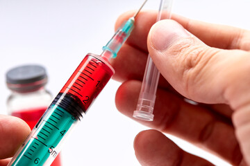  Vaccine in vial with syringe