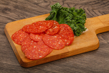 Italian spycy pepperoni sausage slices