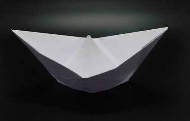 White Paper boat on Black Background