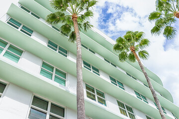 Miami Beach, Florida colorful pastel green house apartment building with Art Deco district style...
