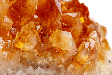 Macro mineral stone Citrine in rock in crystals on a white background