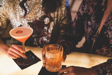 Couple Enjoying Cocktails in a Bar