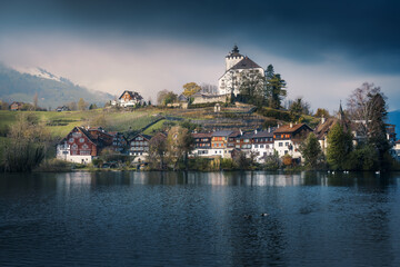 Obraz premium Skyline of Buchs with Werdenberg Castle and Werdenberg Lake - Buchs, Switzerland