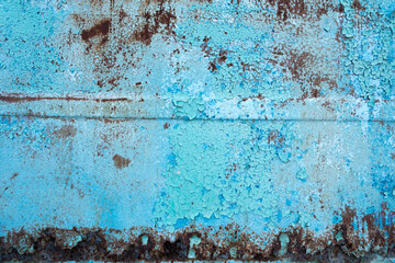 Rusty surface texture. Peeling blue paint. Background