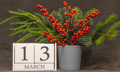 Memory and important date March 13, desk calendar - spring season.